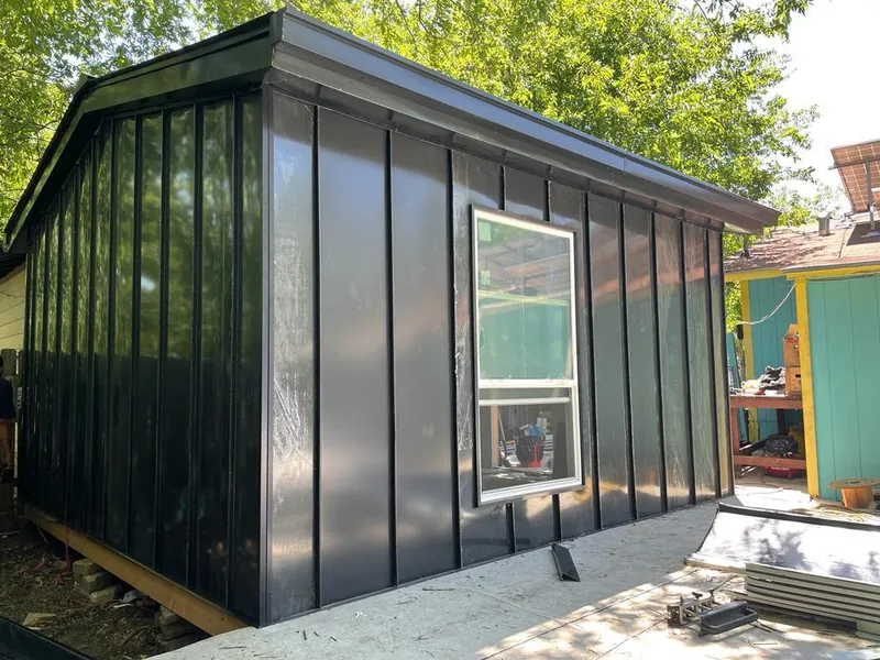 Black standing seam metal wall panels for Metal Roof Installation in South Bound Brook